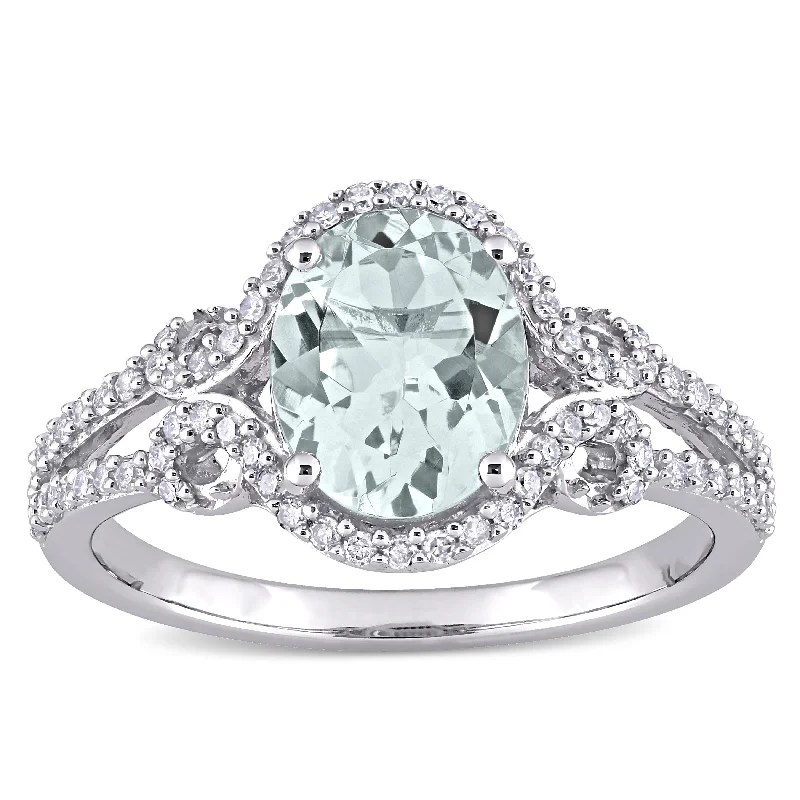 Miadora 10k White Gold Oval-cut Aquamarine and 1/3ct TDW Diamond Halo Split Shank Engagement Ring