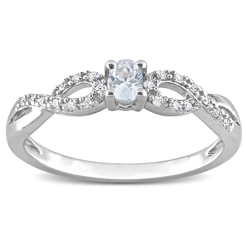 Miadora 1/10ct TDW Diamond and Created White Sapphire Infinity Engagement Ring in Sterling Silver