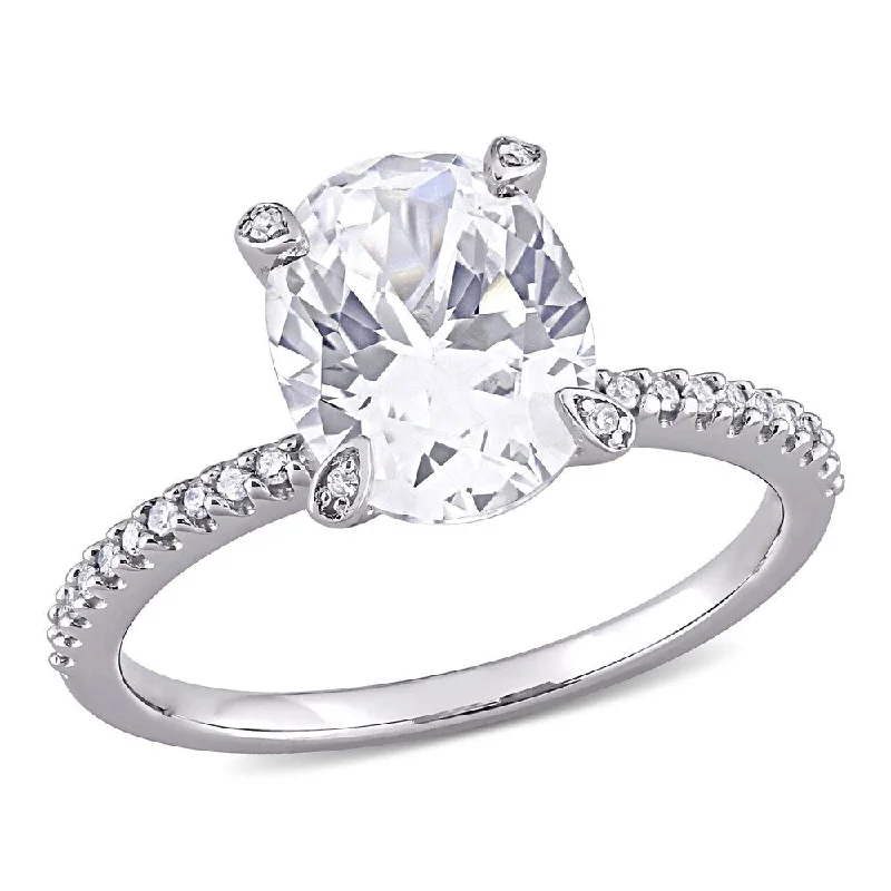 Miadora 10k White Gold Oval-Cut Created White Sapphire and 1/10ct TDW Diamond Engagement Ring